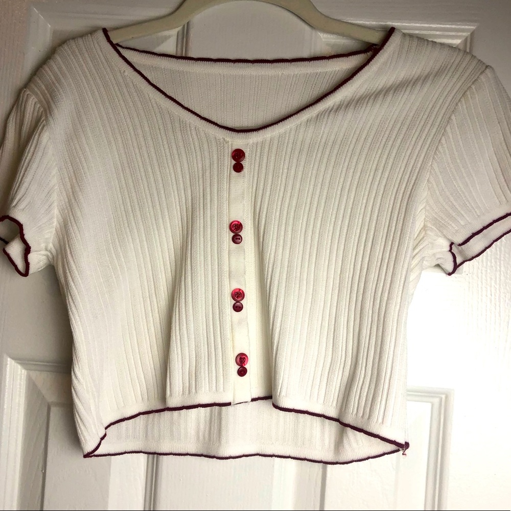 white and red button up crop top.